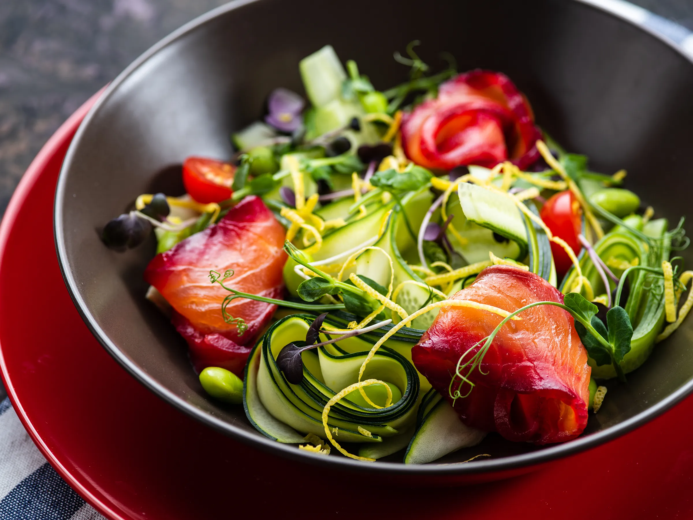 fresh summer salad with greens on plate