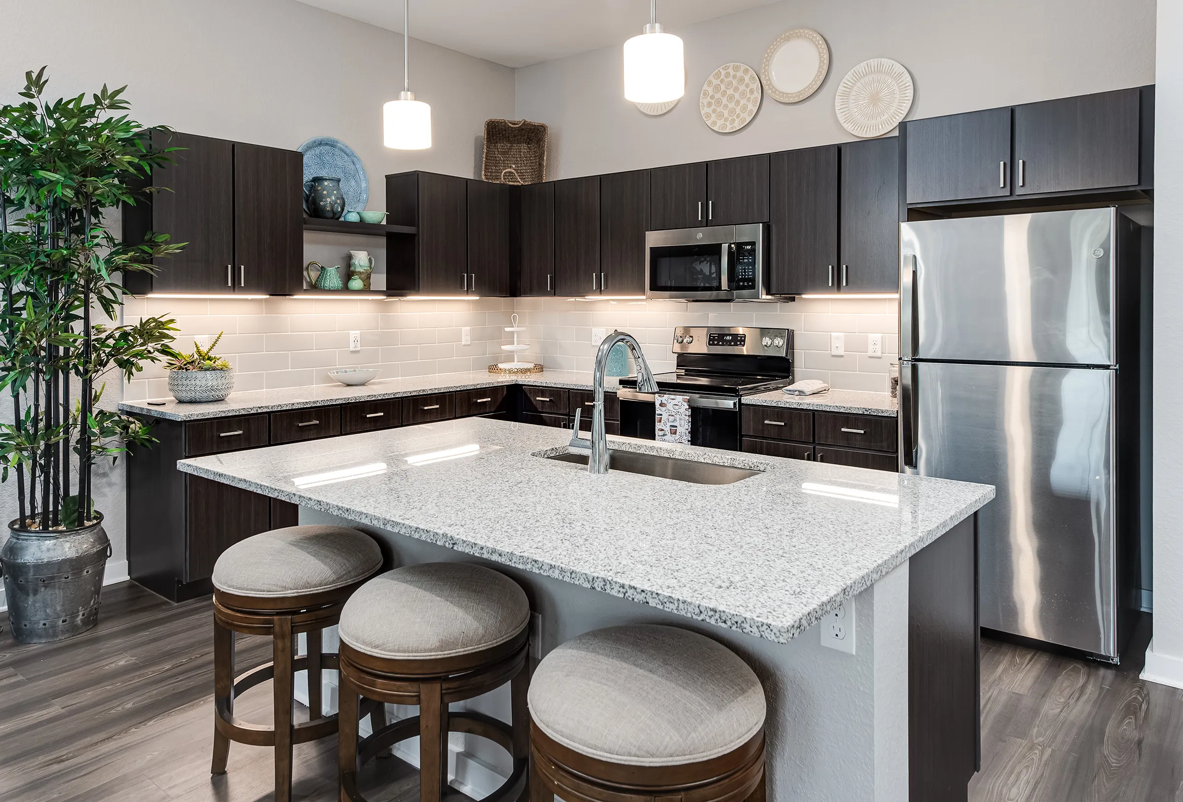 kitchen with large island in independent living villa
